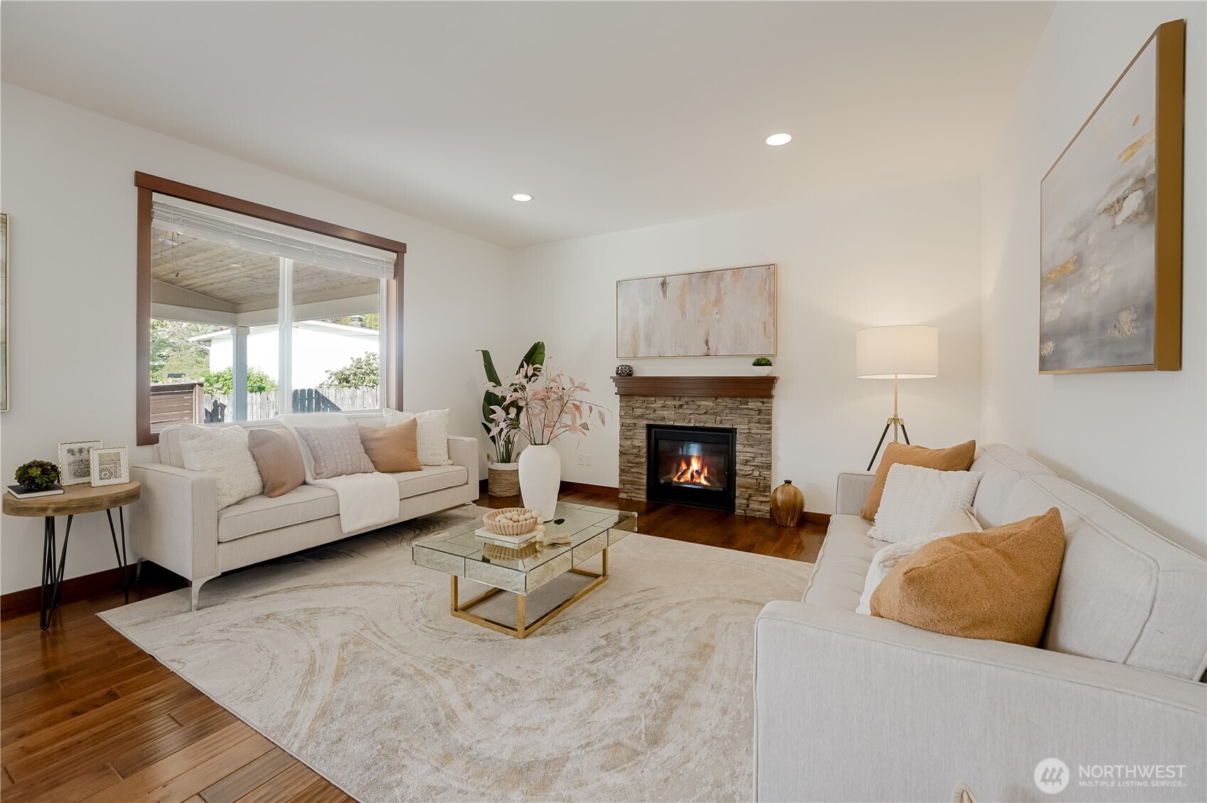 607 217th Street Southwest Bothell, WA 98021 - Photo 5 of 36 a living room with furniture and a fireplace
