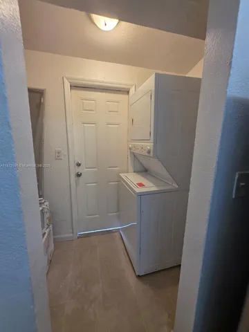 a room with a washer and dryer