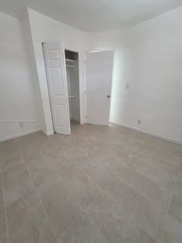 an empty room with closet