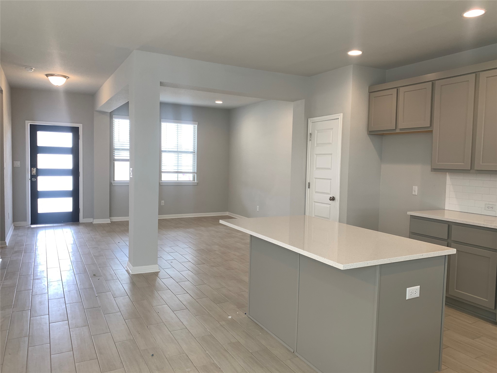 2948 Sage Ranch Drive Leander, TX 78641 - Photo 27 of 28 An open floorplan with a central kitchen island creates a seamless living space.