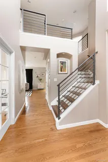 a view of a hallway with furniture and entryway
