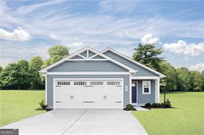 104 Acer Court Hampton, GA 30228 - Photo 1 of 1 a view of a house with yard and a garden