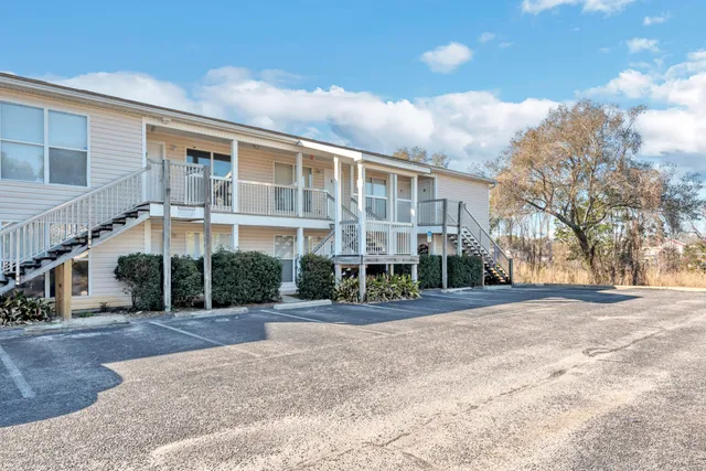 a front view of a building with street view