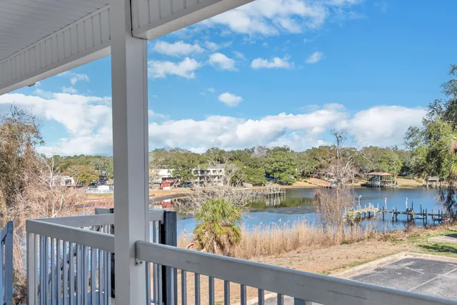 a view of a lake from a balcony