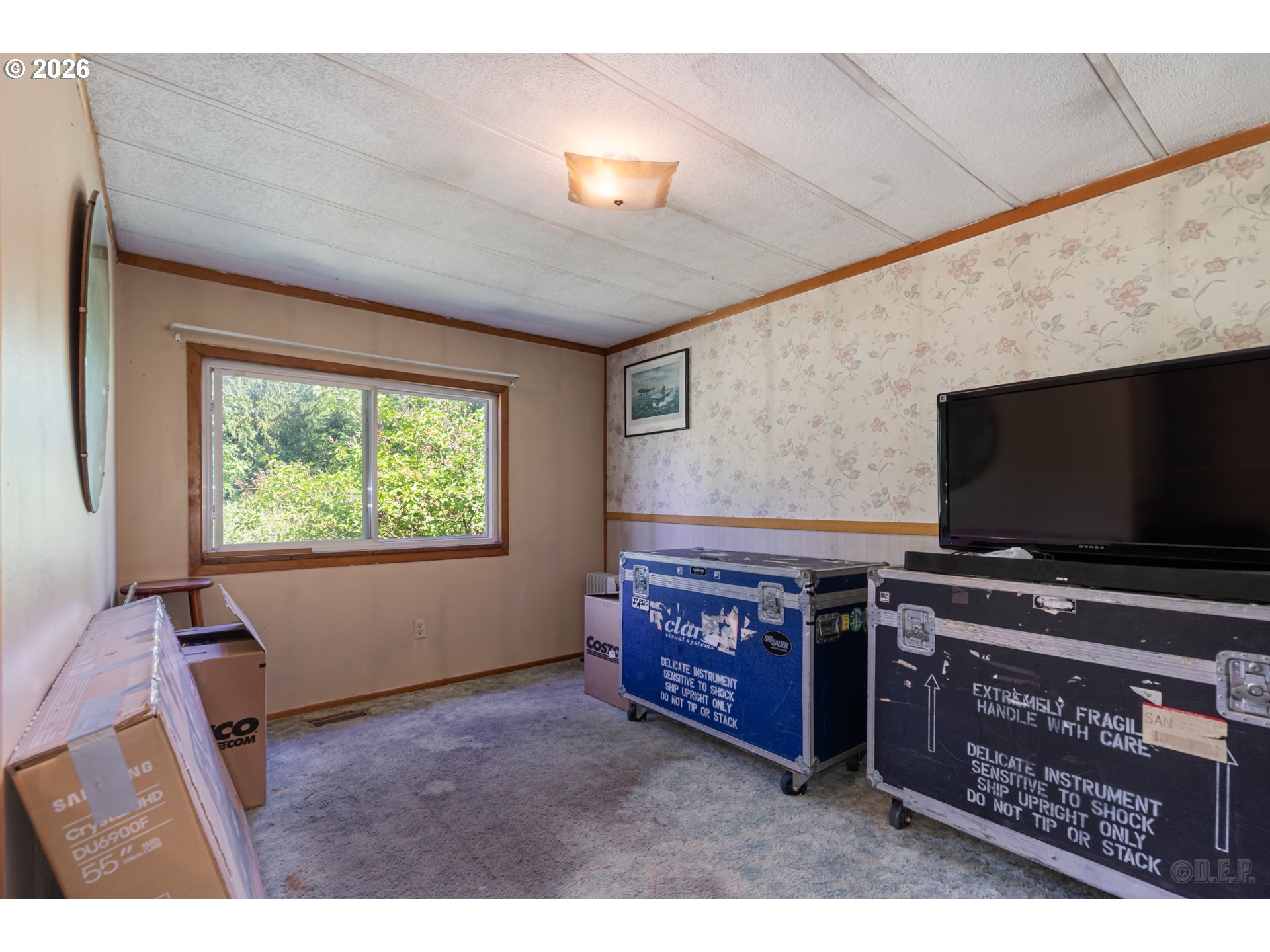 66971 Maplecrest Road Deer Island, OR 97054 - Photo 16 of 24 a room with furniture and a flat screen tv