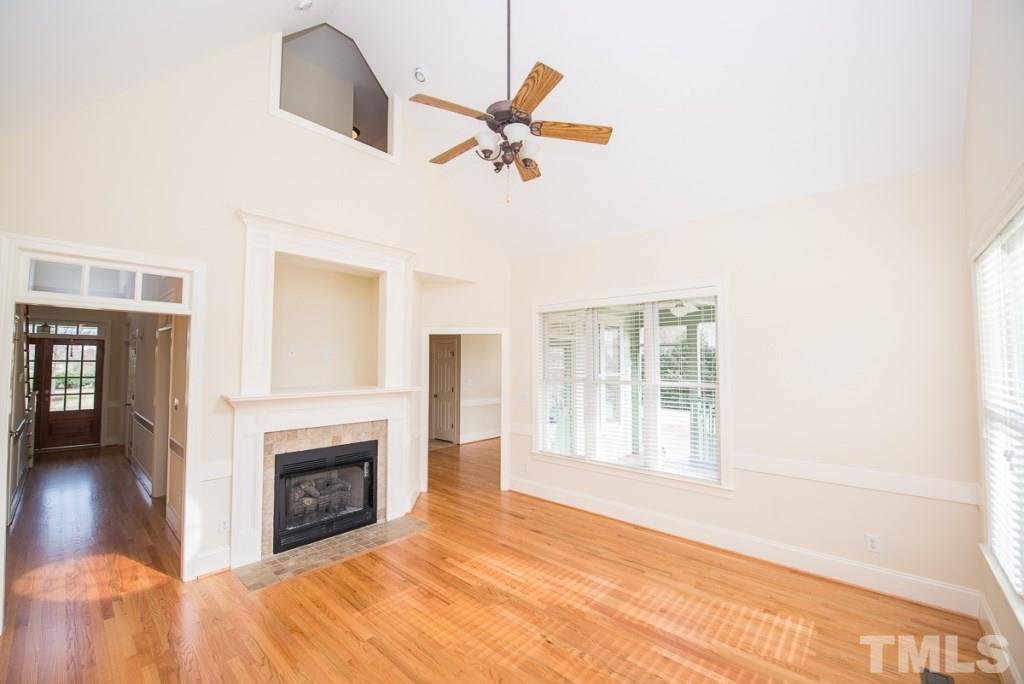4528 Deer Stream Lane Raleigh, NC 27603 - Photo 8 of 25 Another view of the family room with refinished hardwoods.