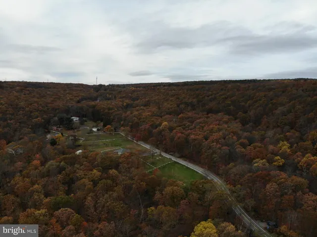 a view of a door and wooden deck