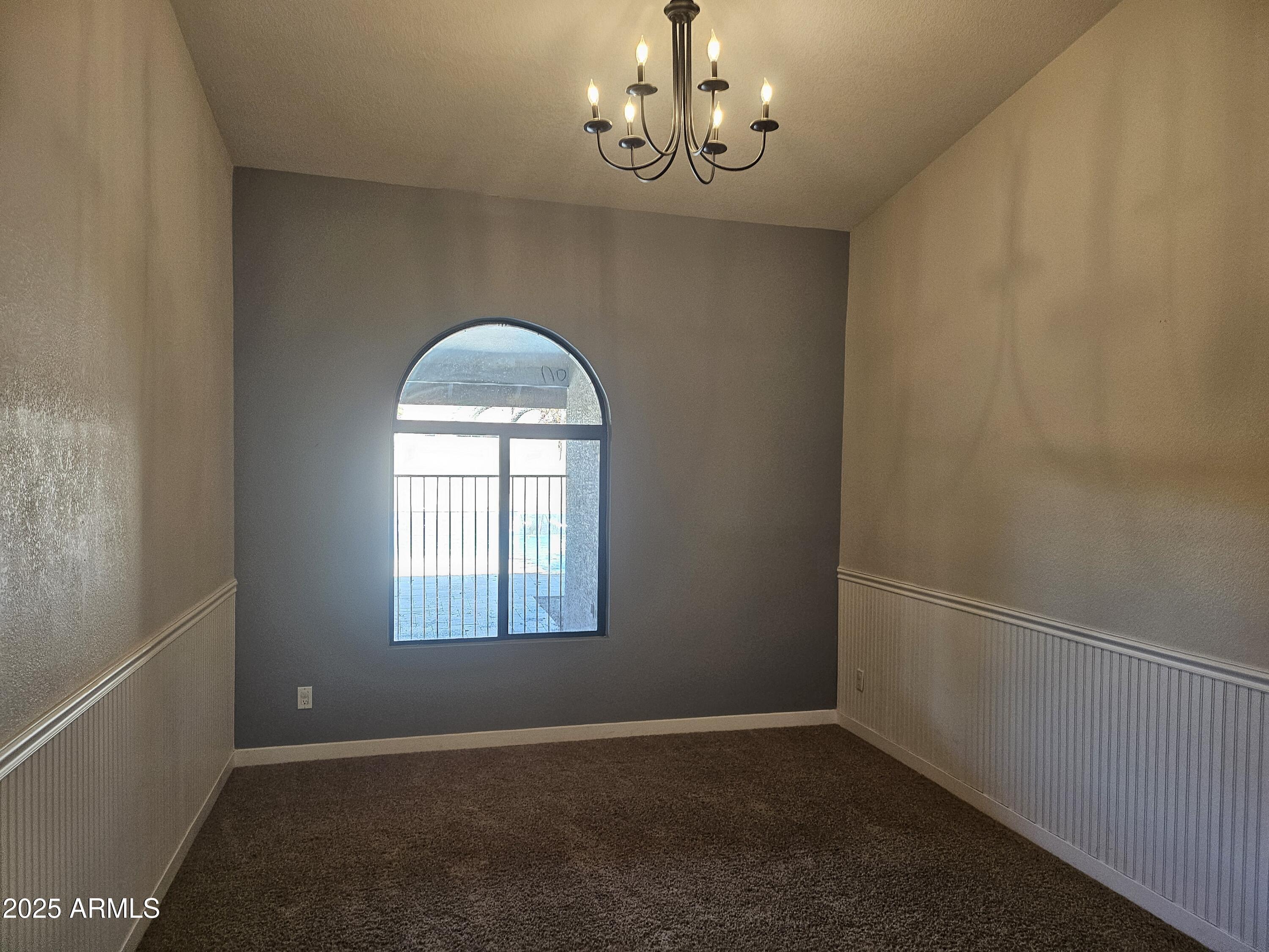 6002 East Marconi Avenue Scottsdale, AZ 85254 - Photo 12 of 29 an empty room that has a window