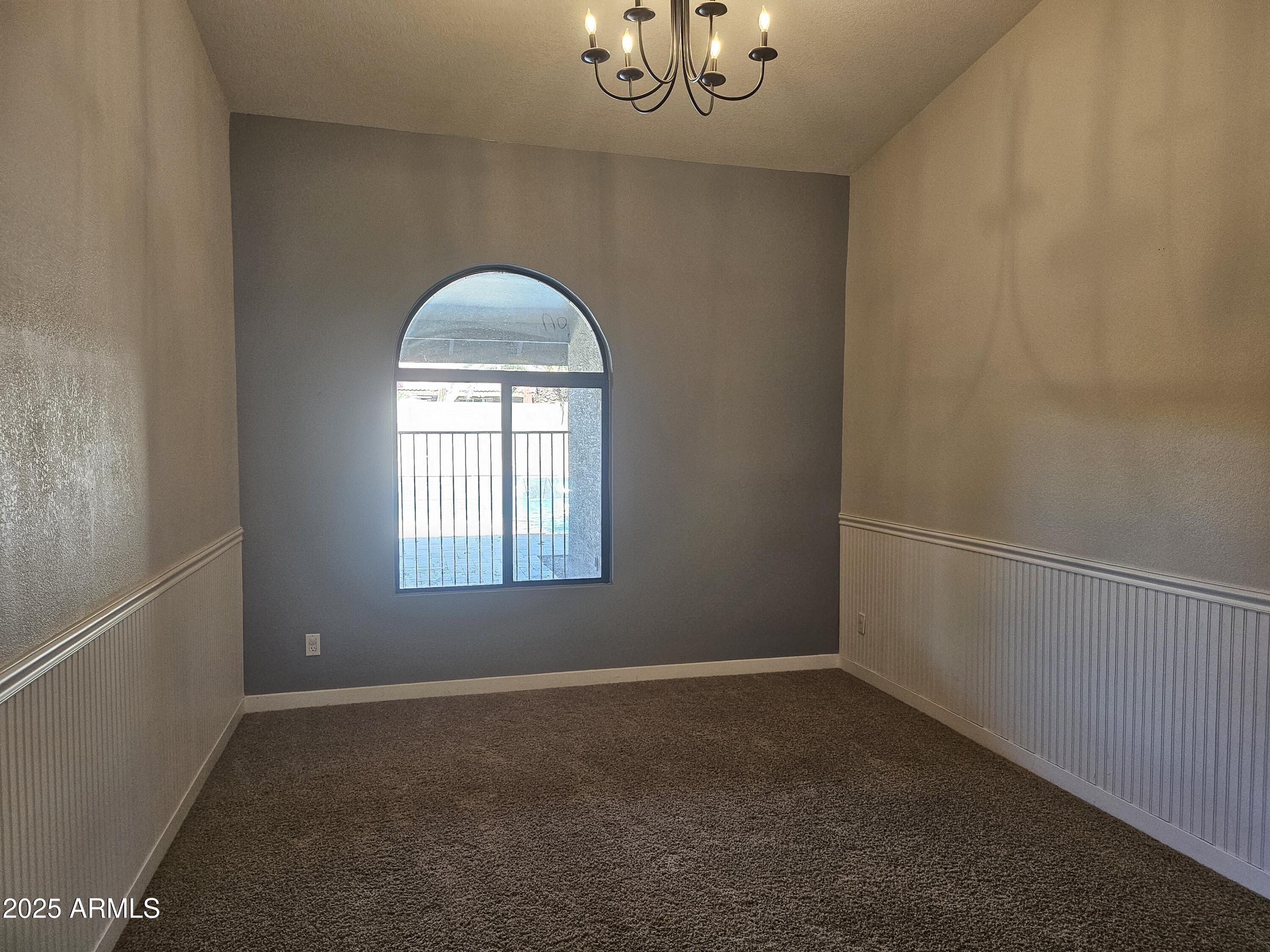 6002 East Marconi Avenue Scottsdale, AZ 85254 - Photo 13 of 29 an empty room with a window