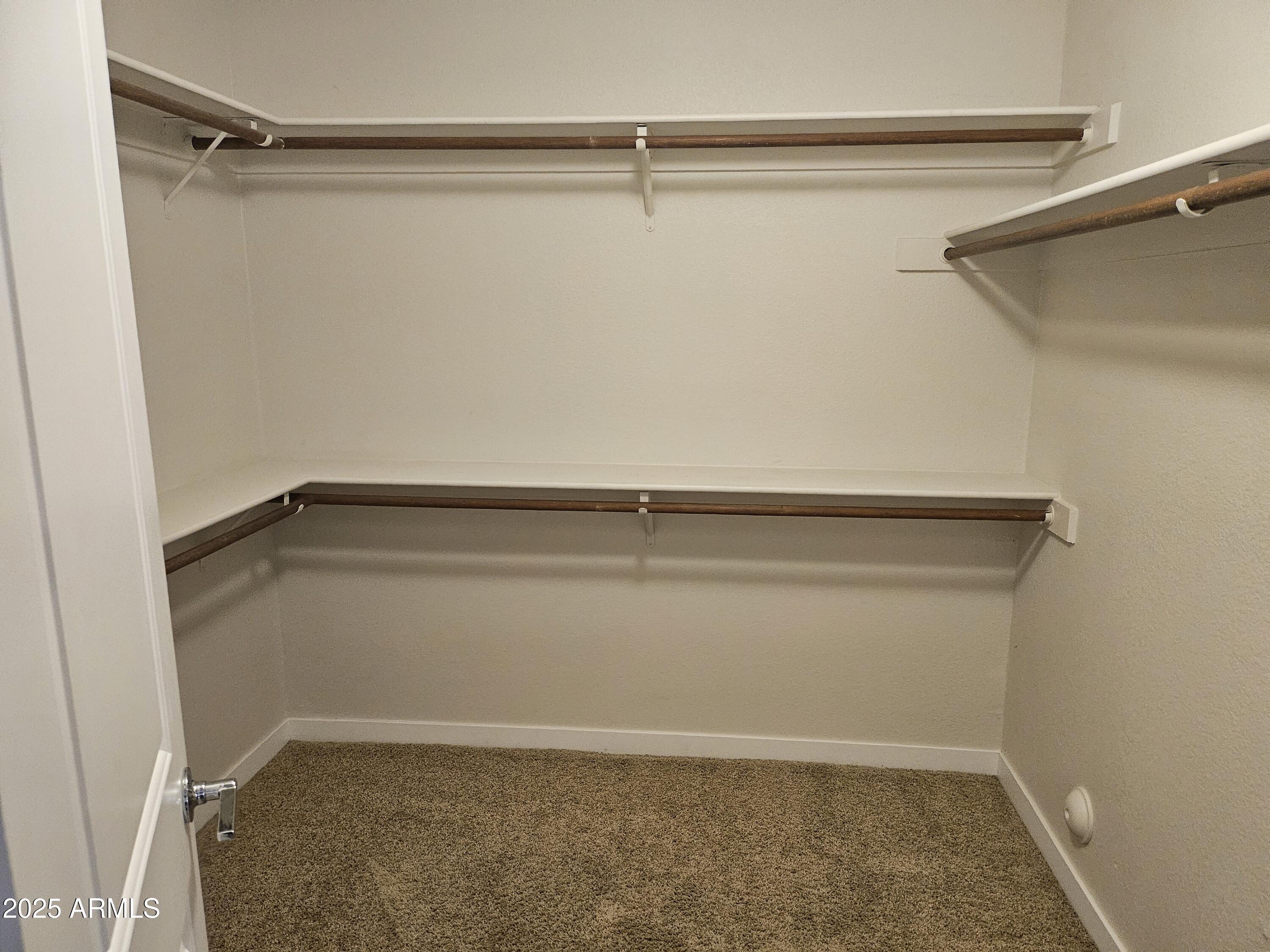 6002 East Marconi Avenue Scottsdale, AZ 85254 - Photo 16 of 29 a view of a room with shelf