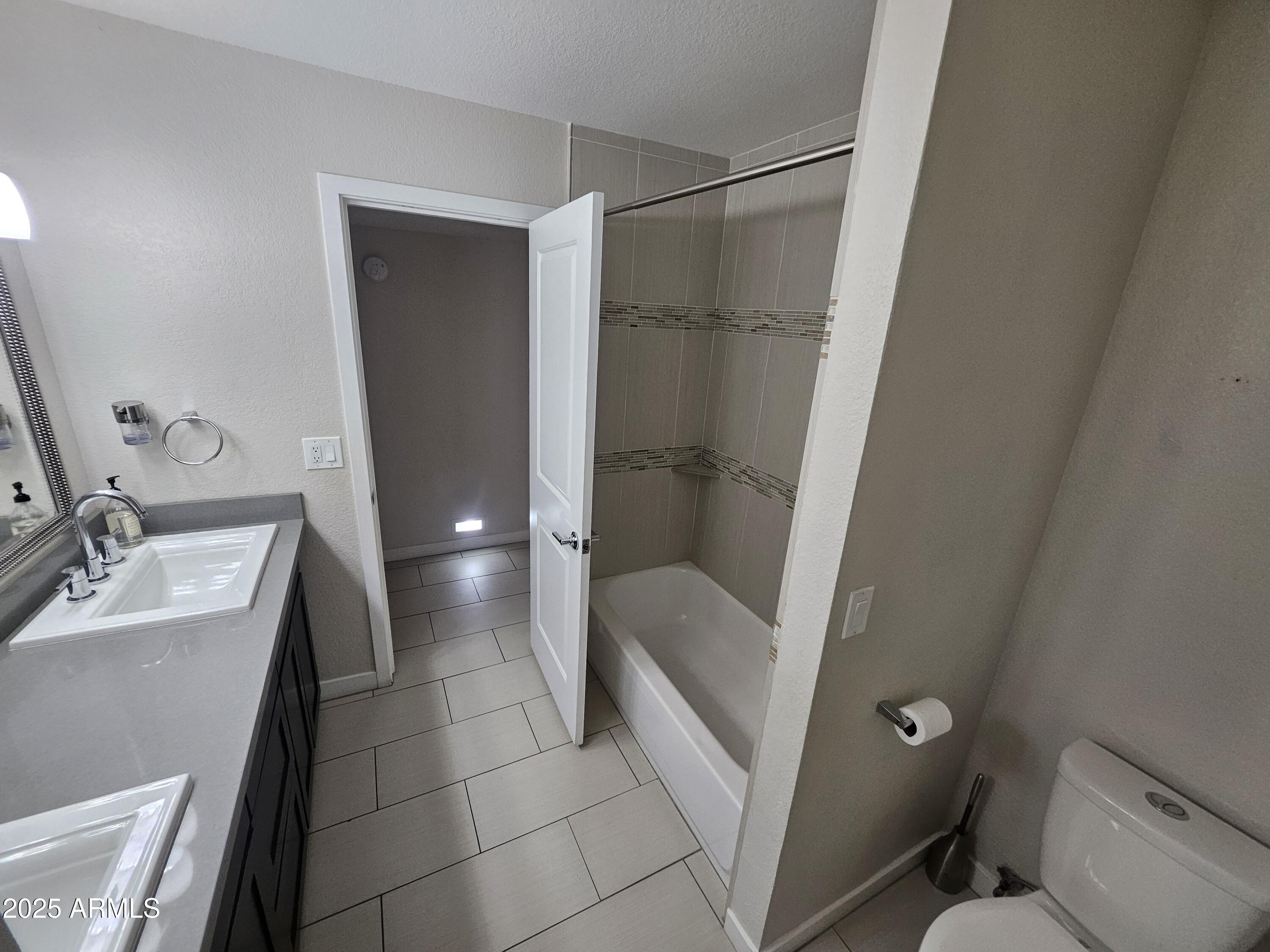 6002 East Marconi Avenue Scottsdale, AZ 85254 - Photo 24 of 29 a bathroom with a sink and toilet