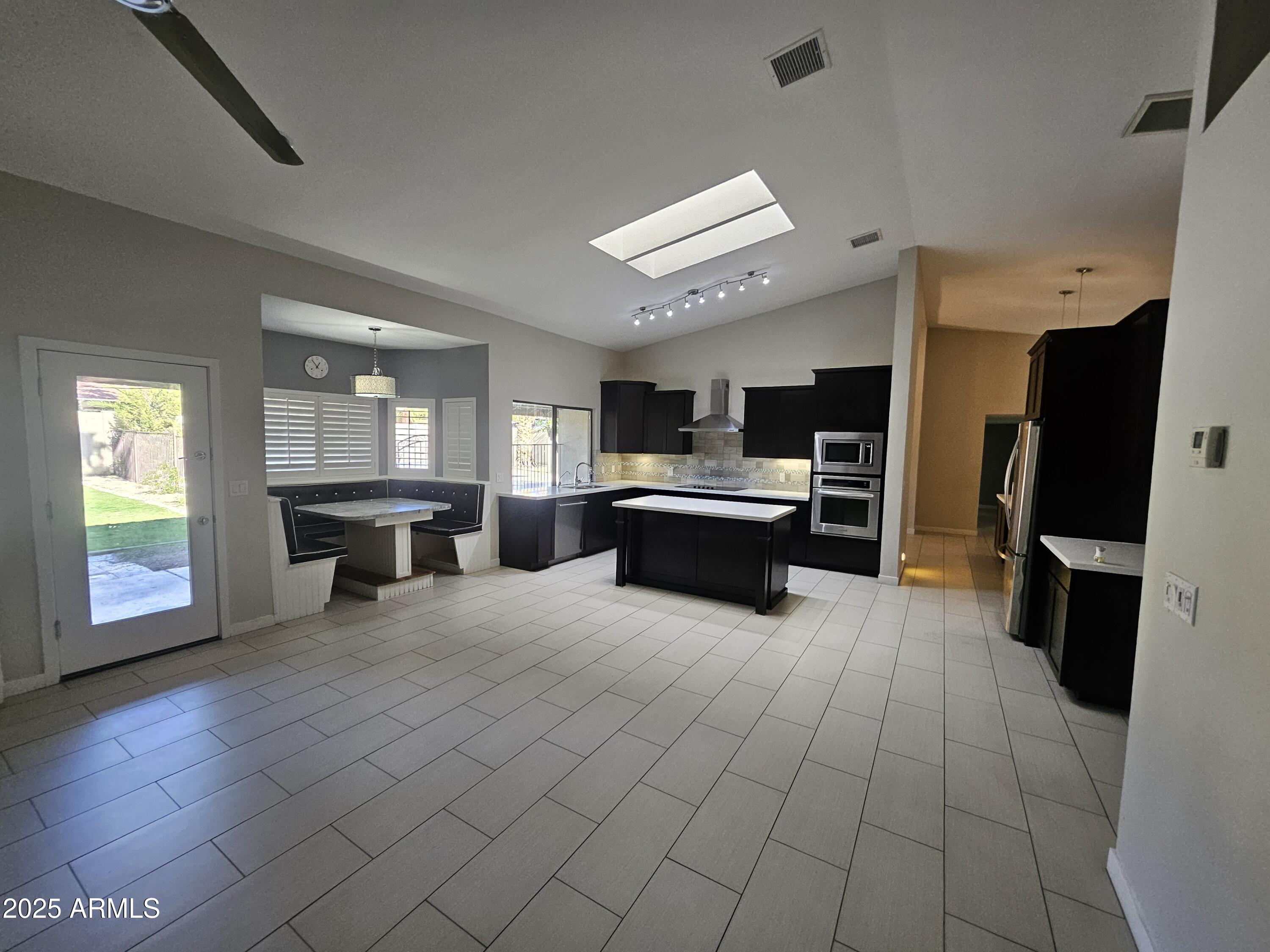 6002 East Marconi Avenue Scottsdale, AZ 85254 - Photo 7 of 29 a large room with windows