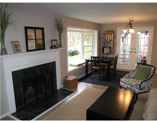 139 Oakhurst Road Pittsburgh, PA 15215 - Photo 3 of 16 Living Room. The living room features hardwood flooring and a beautiful fireplace with mantel.
