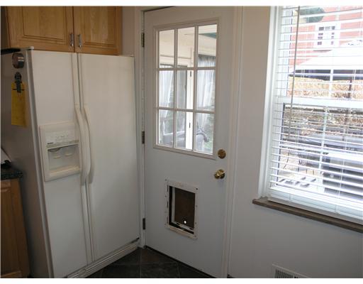 139 Oakhurst Road Pittsburgh, PA 15215 - Photo 9 of 16 Kitchen. The kitchen walks out to the rear patio and also provides a handy pet door.