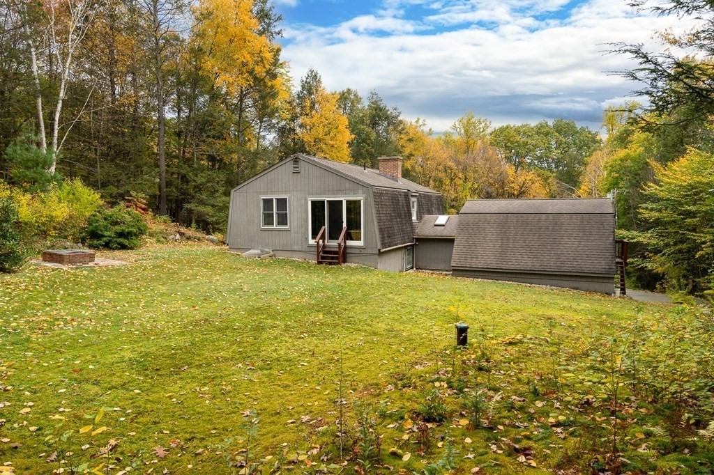 137 Fomer Road Southampton, MA 01073 - Photo 4 of 42 a front view of house with yard and trees around