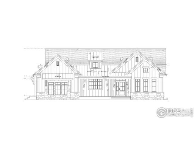 a view of a white house next to a yard