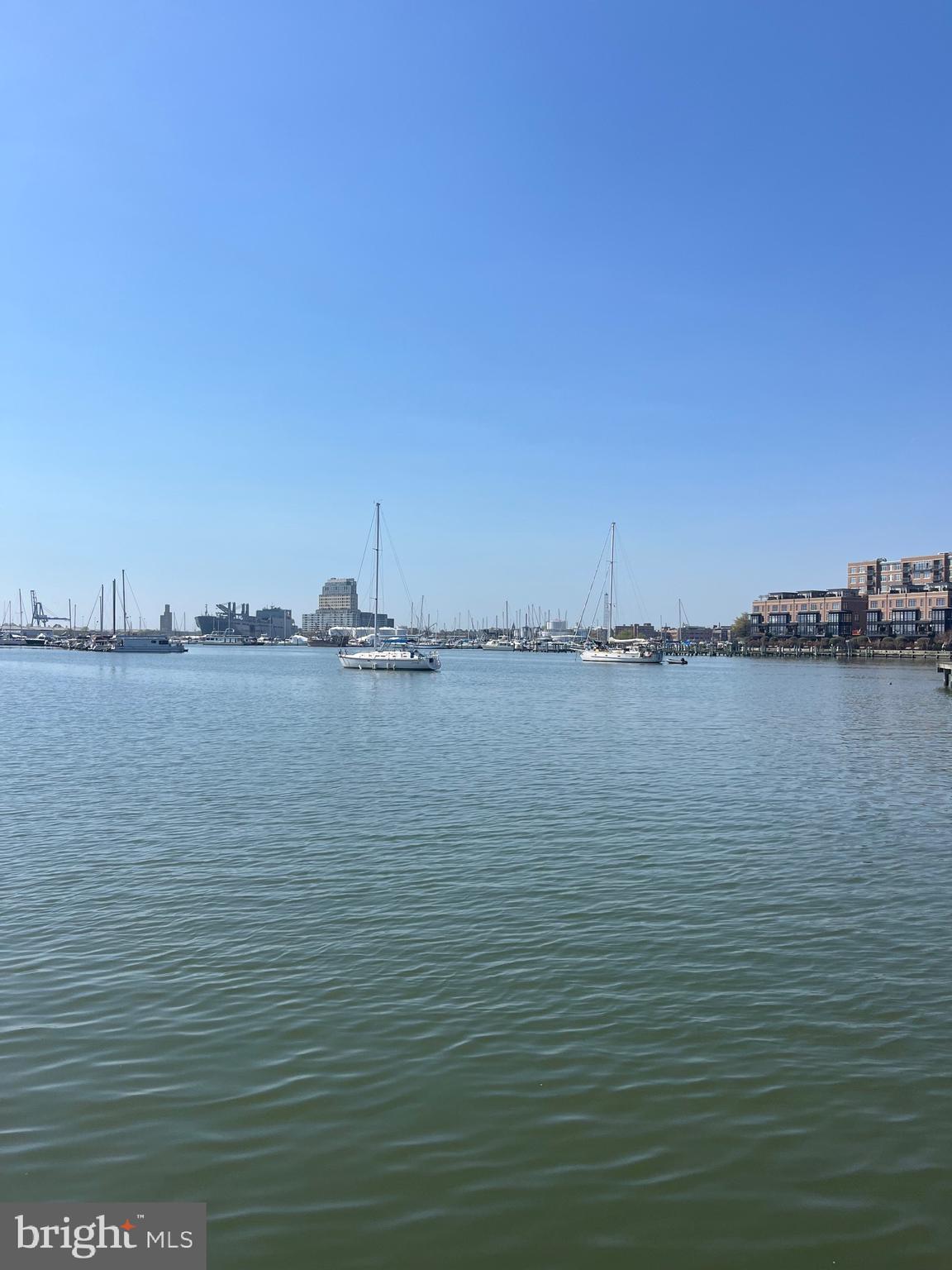 2327 Boston Street, Unit 4 Baltimore, MD 21224 - Photo 2 of 3 a view of a ocean with boats in it
