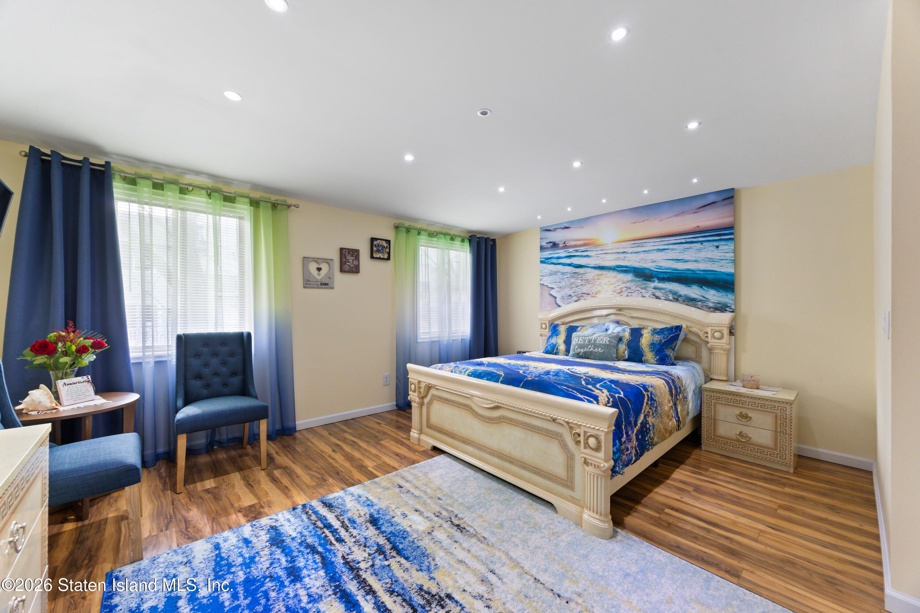 23 Stack Drive Staten Island, NY 10312 - Photo 15 of 29 a bedroom with a bed and wooden floor