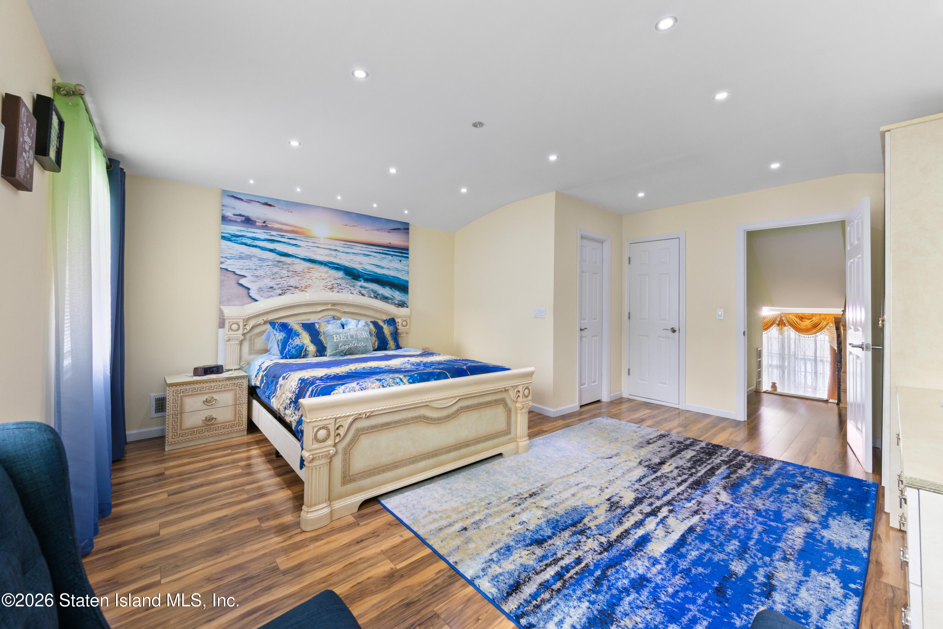 23 Stack Drive Staten Island, NY 10312 - Photo 17 of 29 a bedroom with bed and wooden floor