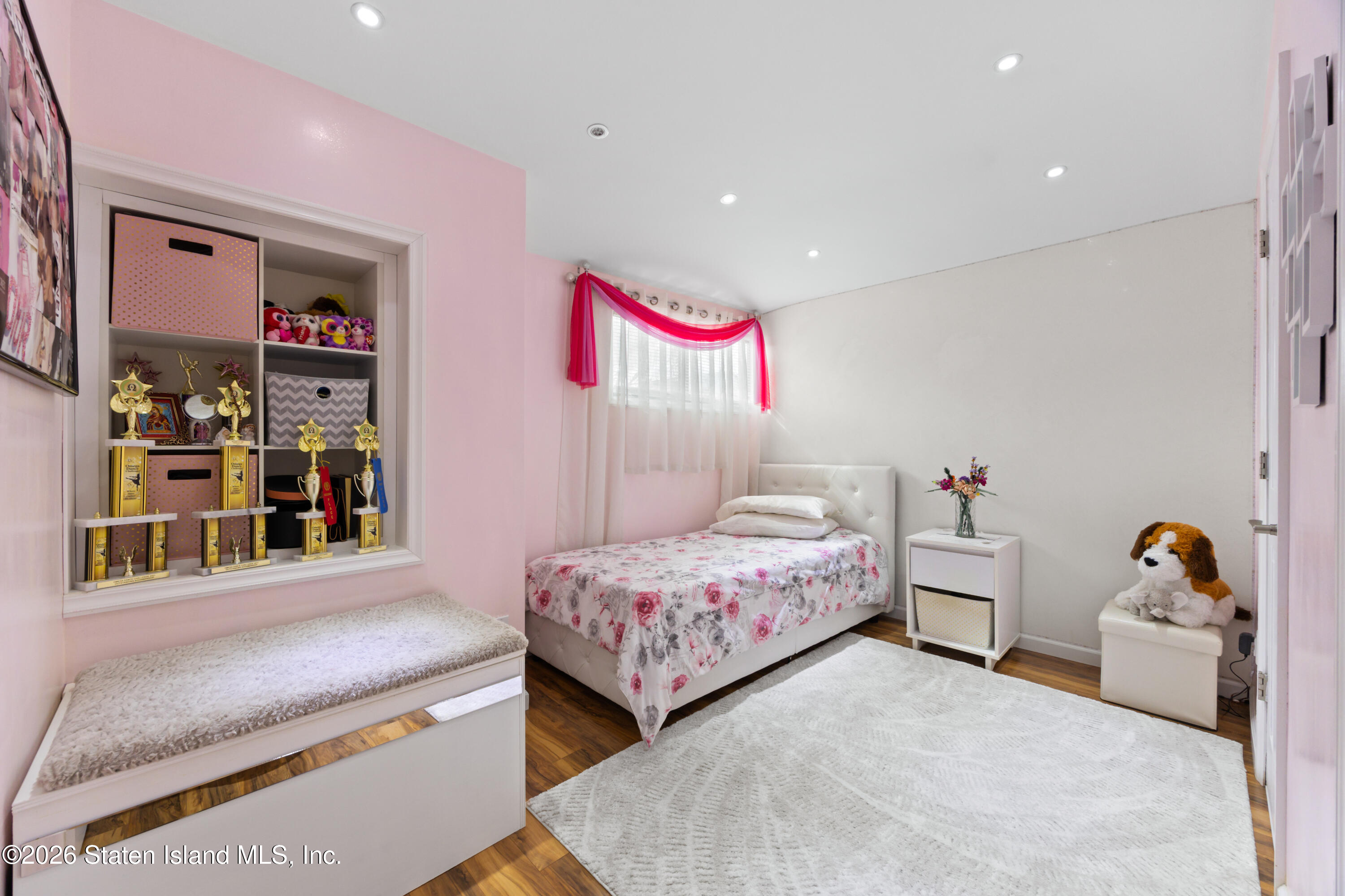 23 Stack Drive Staten Island, NY 10312 - Photo 18 of 29 a bedroom with two beds and a window