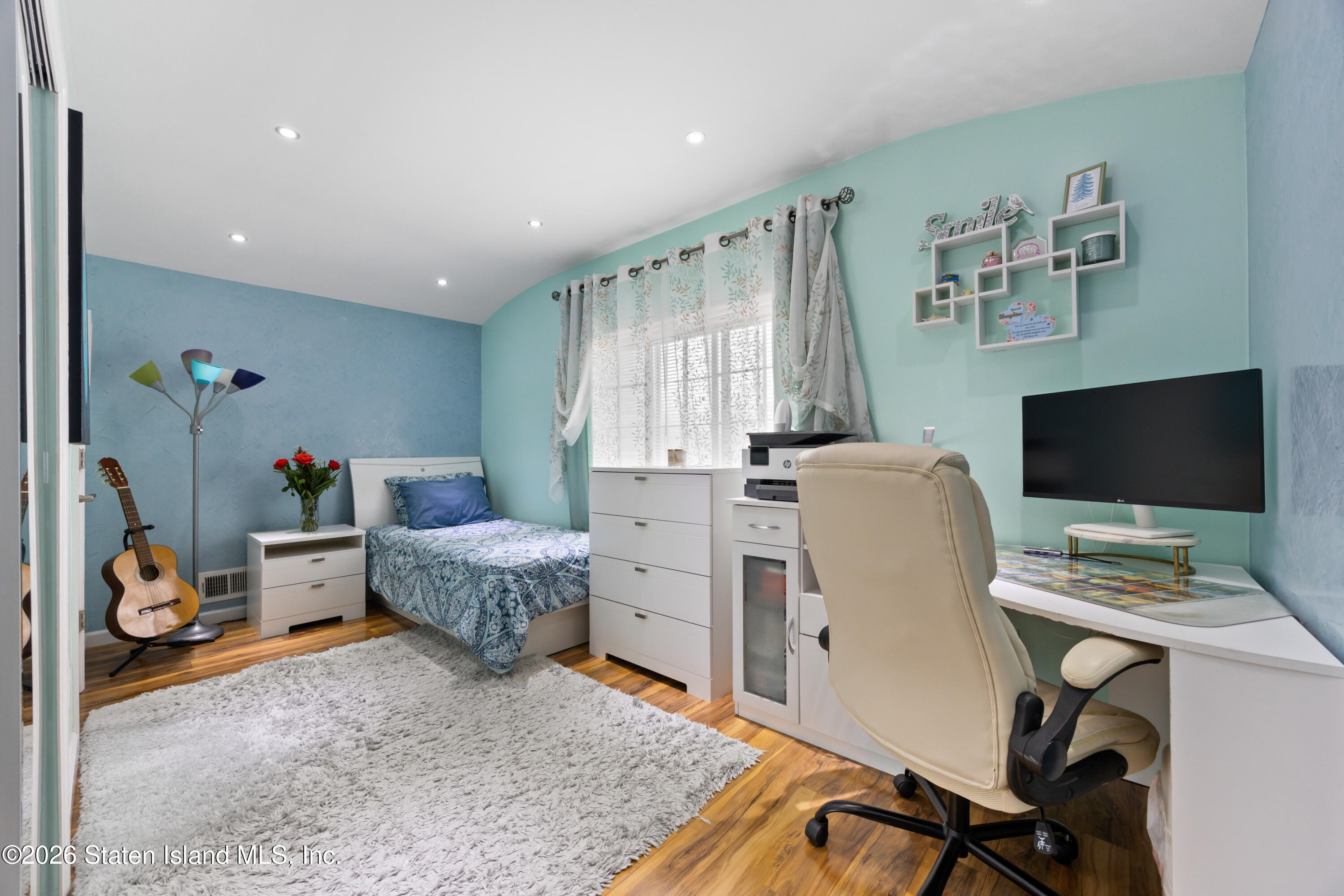 23 Stack Drive Staten Island, NY 10312 - Photo 21 of 29 a workspace with furniture and a window