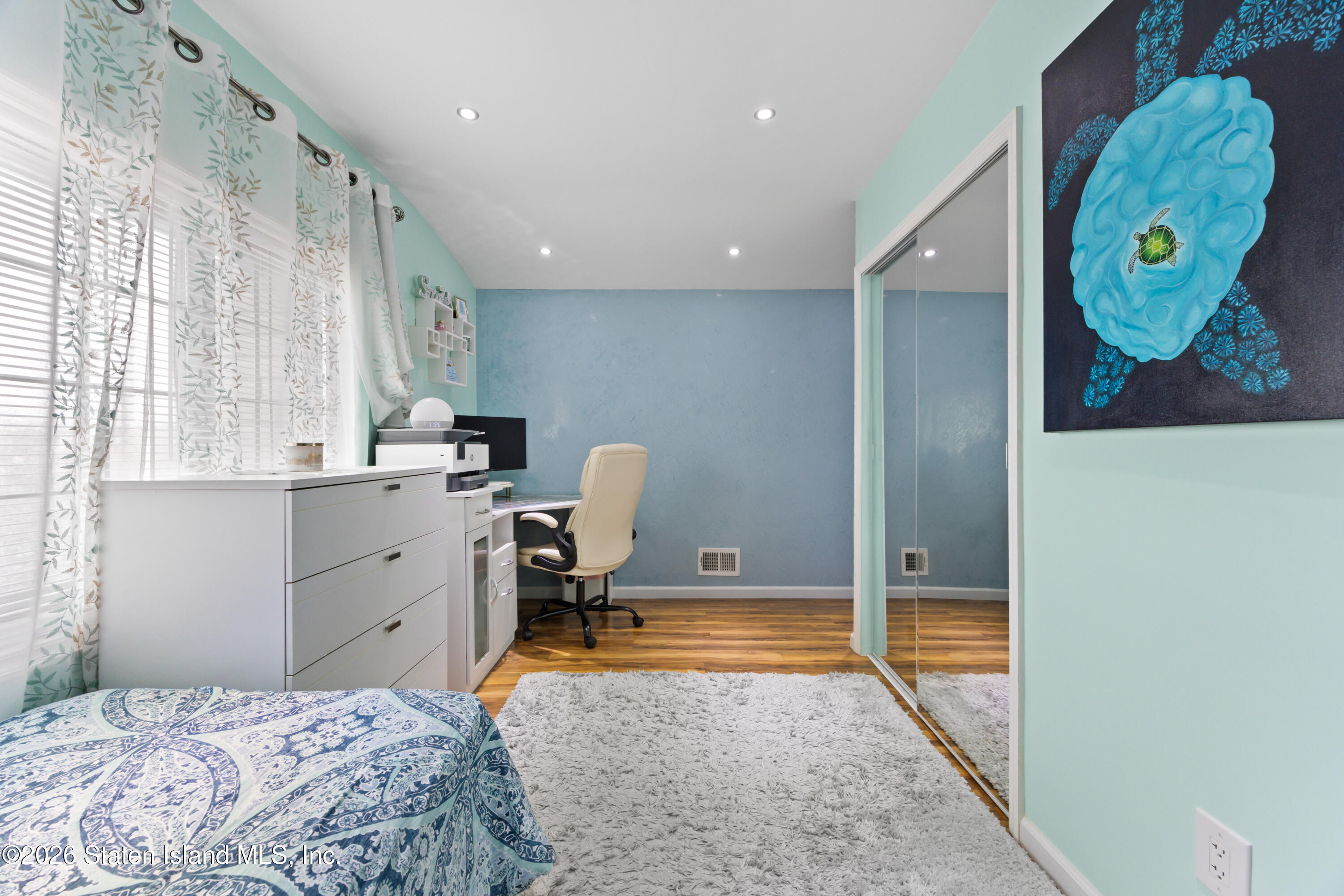 23 Stack Drive Staten Island, NY 10312 - Photo 22 of 29 a bedroom with a bed and a window