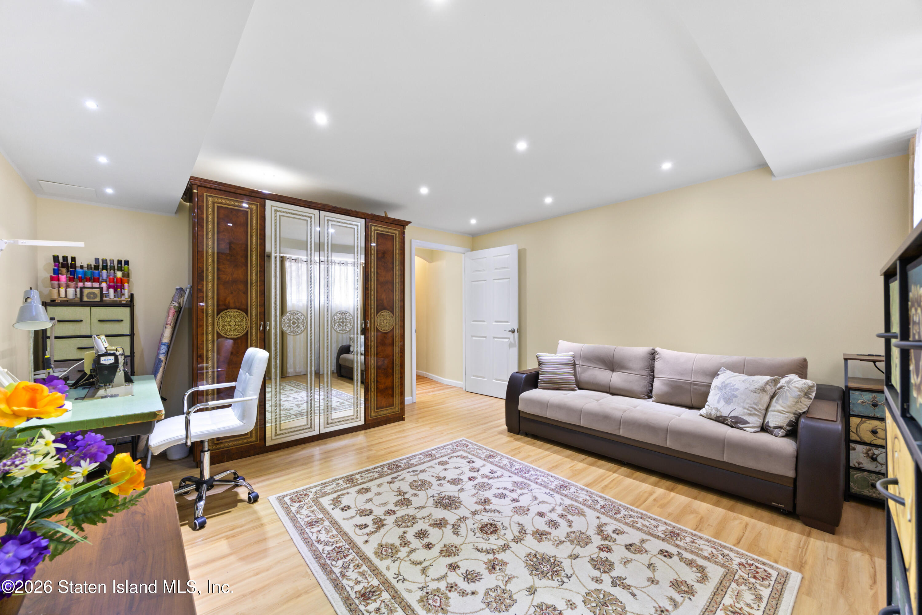 23 Stack Drive Staten Island, NY 10312 - Photo 3 of 29 a living room with furniture and wooden floor