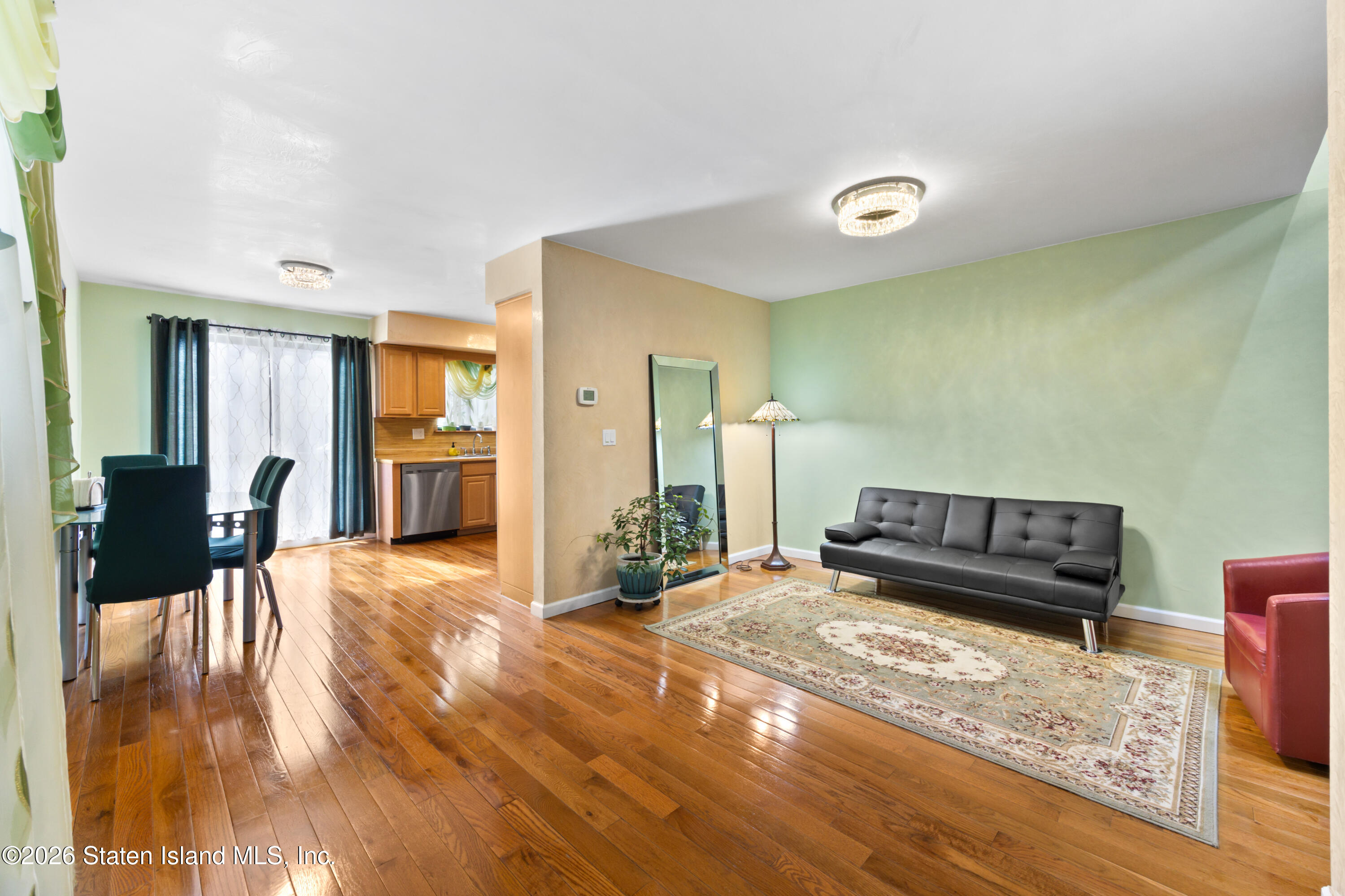 23 Stack Drive Staten Island, NY 10312 - Photo 5 of 29 a living room with furniture and a wooden floor