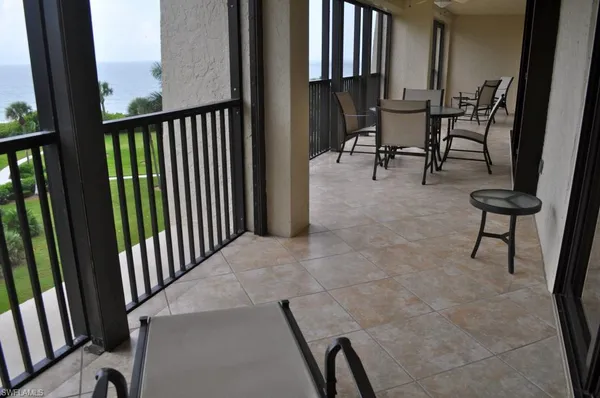 a view of a chairs and bench in kitchen