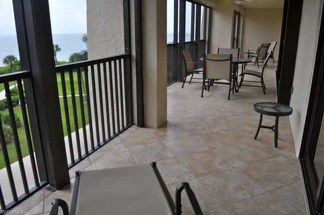 a view of a chairs and bench in kitchen