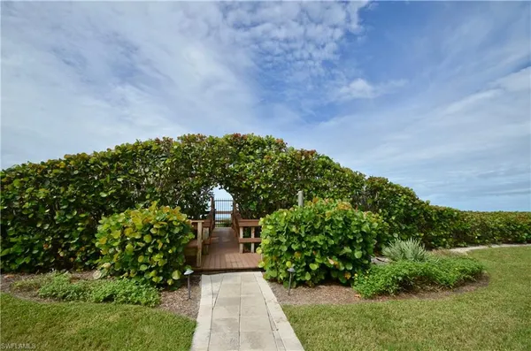a view of balcony and yard