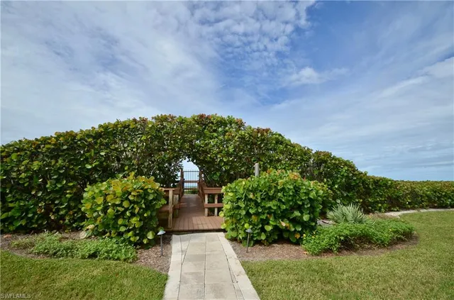 a view of balcony and yard