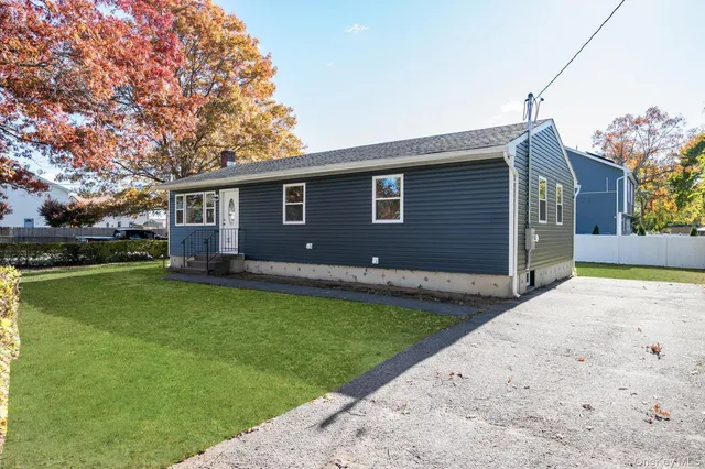 a backyard of a house with lots of green space