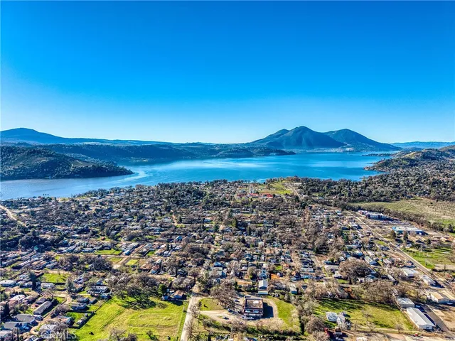 a view of a street with a building in the background