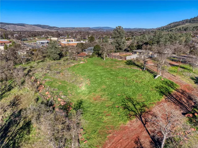 a view of a city with mountains in the background