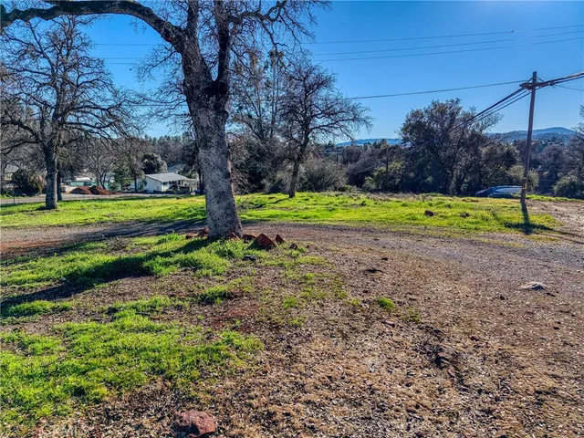 a view of a city with mountains in the background