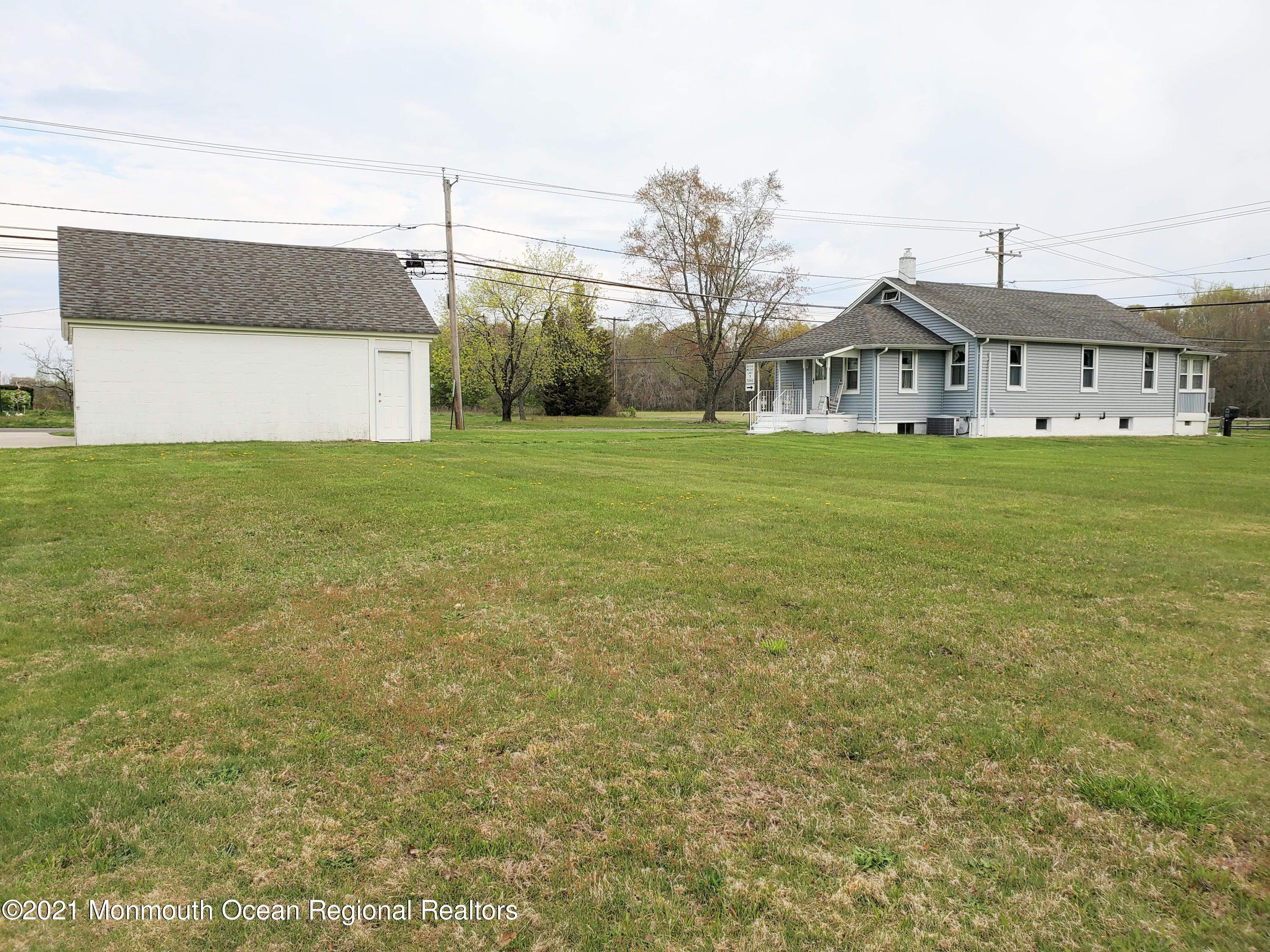 50 Hawkin Road Medford, NJ 08055 - Photo 2 of 28 a front view of a house with garden