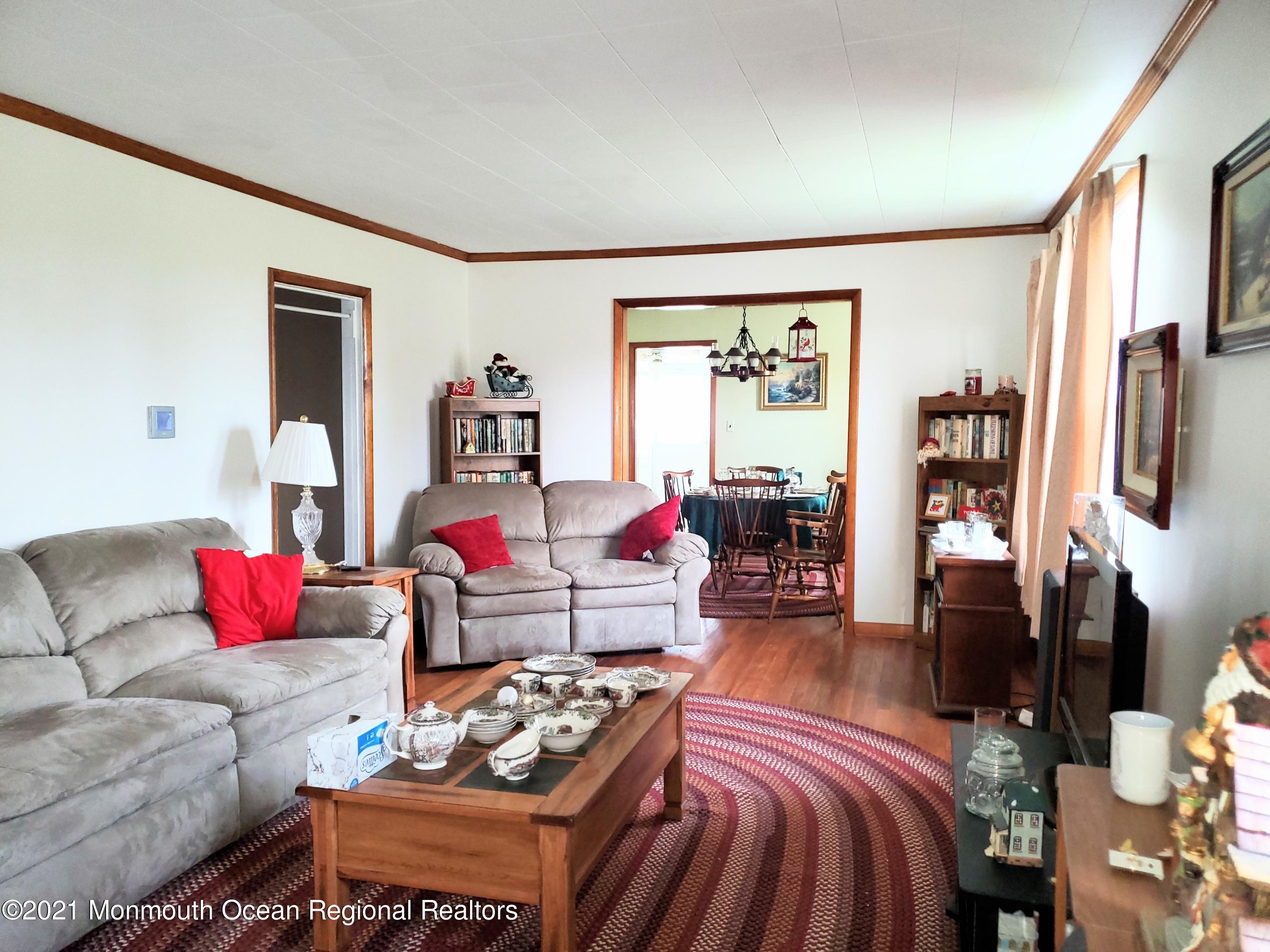 50 Hawkin Road Medford, NJ 08055 - Photo 13 of 28 a living room with furniture and a flat screen tv