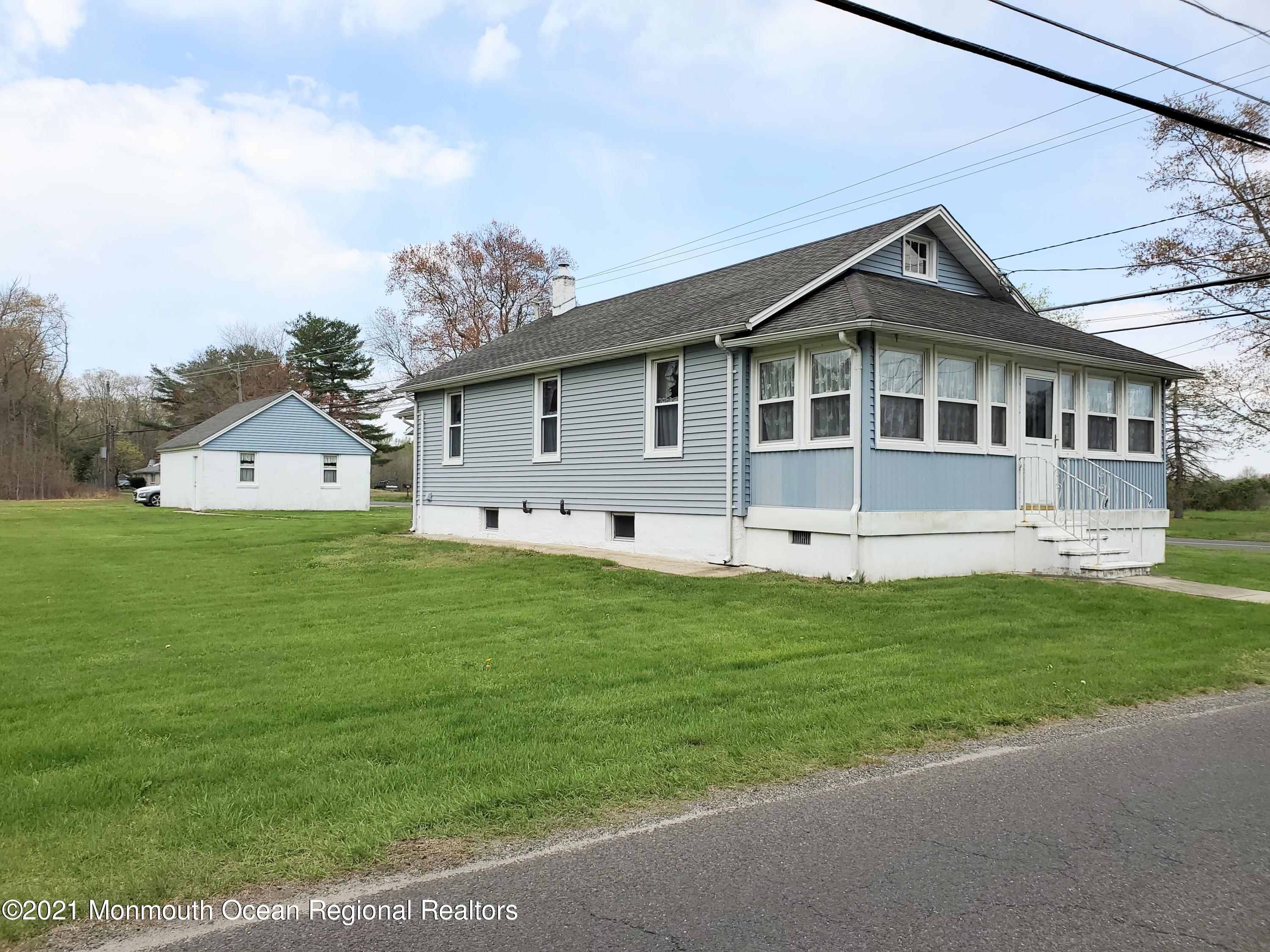 50 Hawkin Road Medford, NJ 08055 - Photo 16 of 28 a front view of a house with a garden