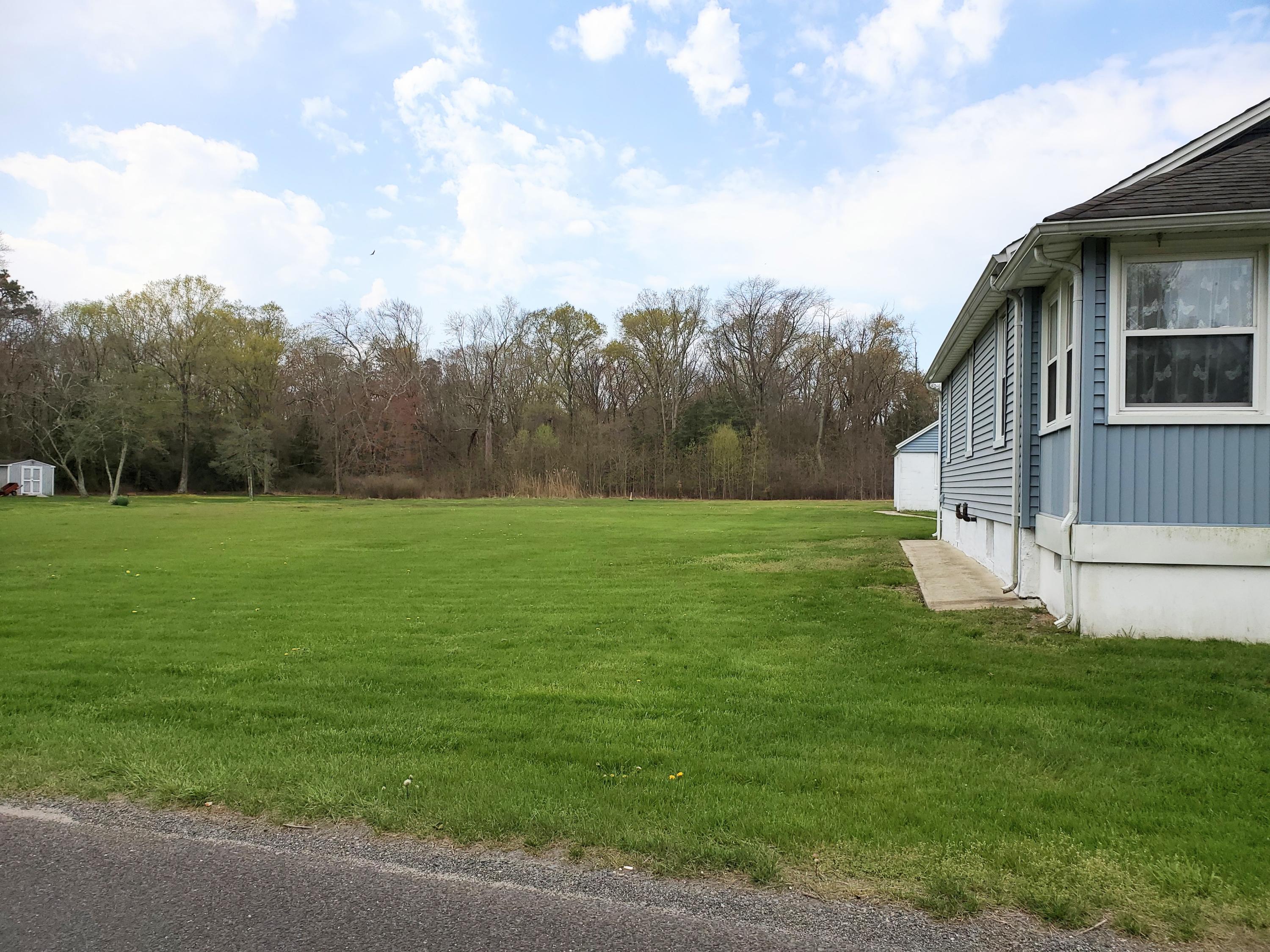 50 Hawkin Road Medford, NJ 08055 - Photo 19 of 28 a view of a house with a yard
