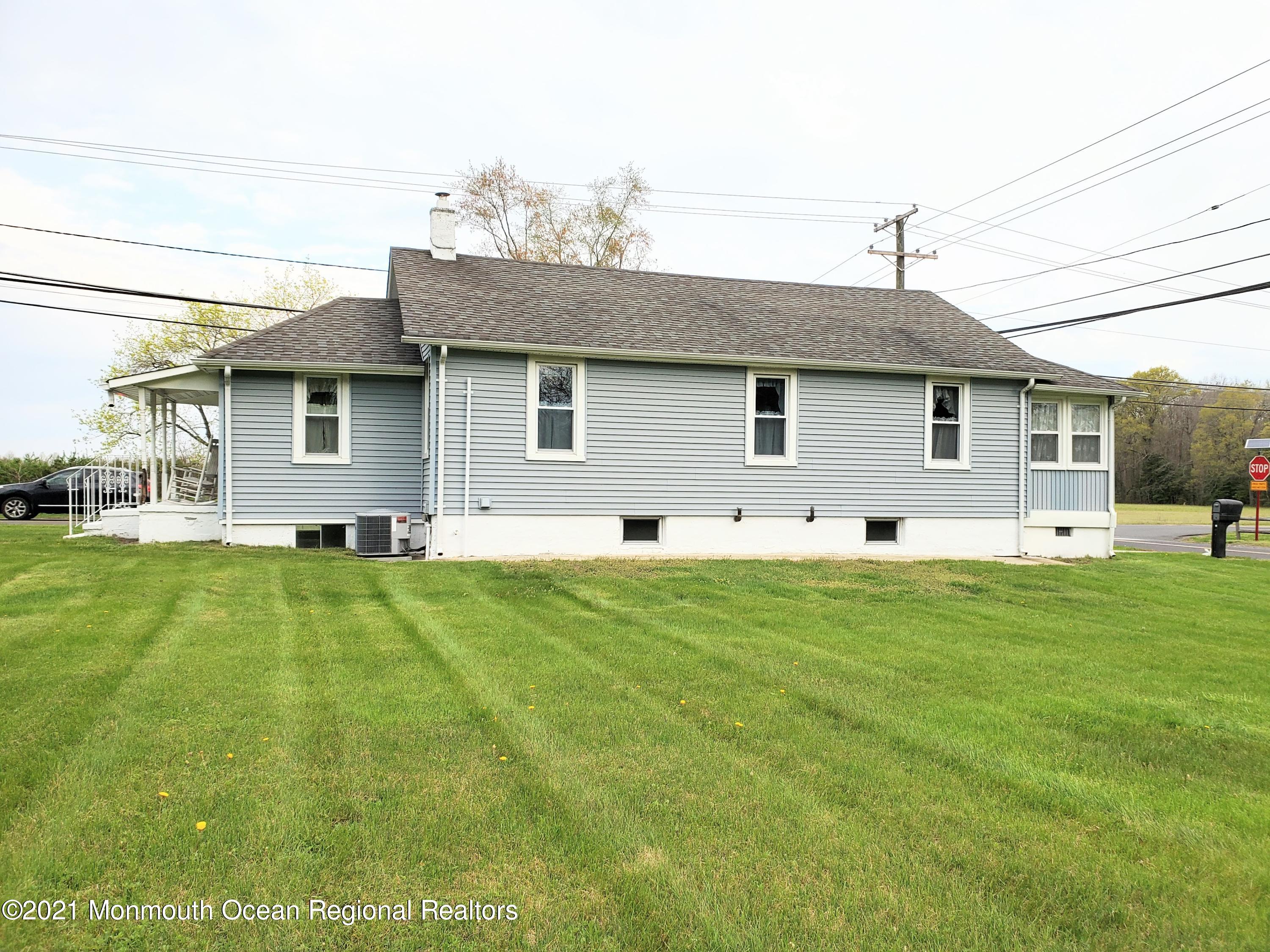 50 Hawkin Road Medford, NJ 08055 - Photo 21 of 28 a front view of house with yard and green space
