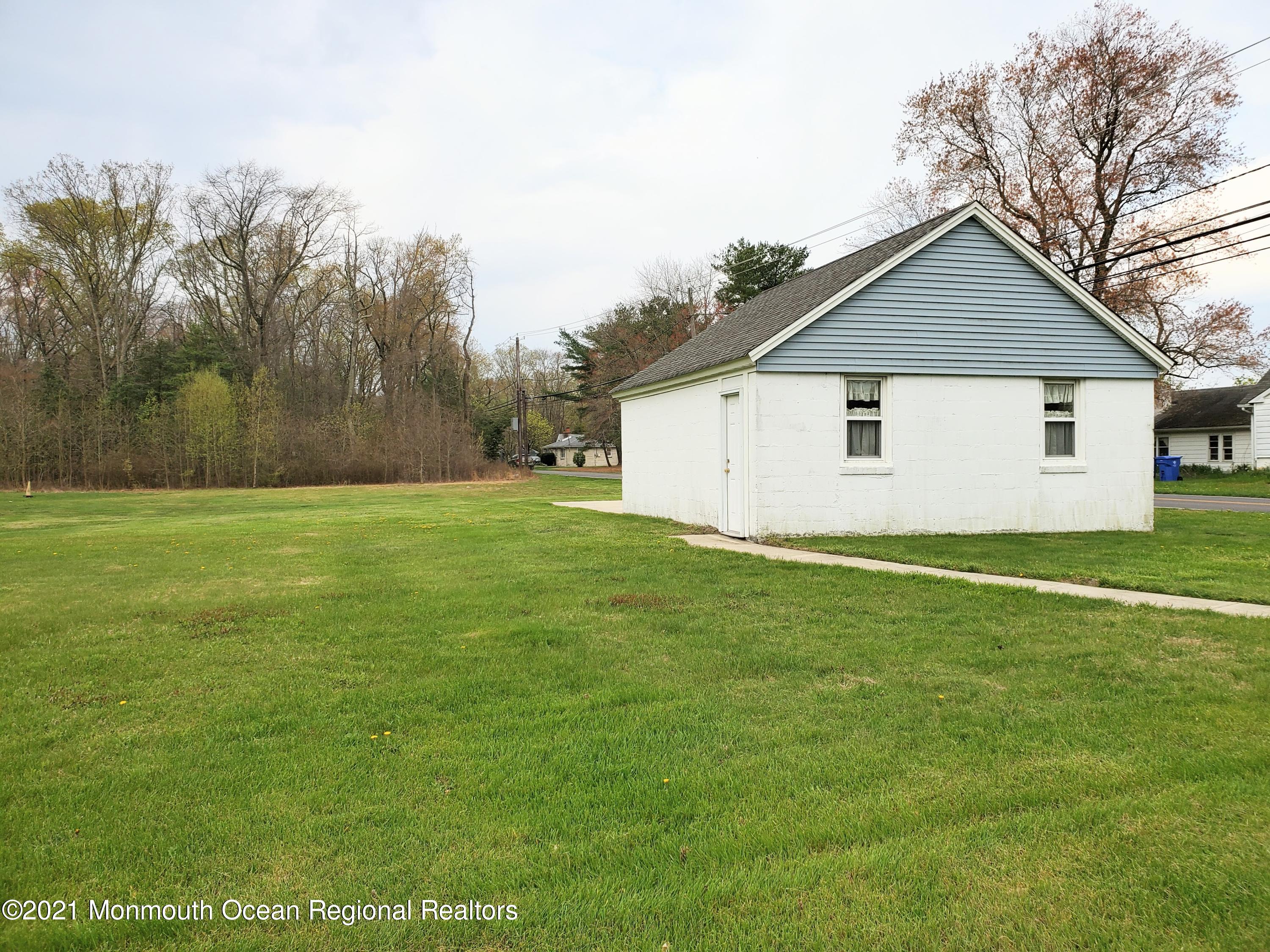 50 Hawkin Road Medford, NJ 08055 - Photo 22 of 28 a view of a house with a yard