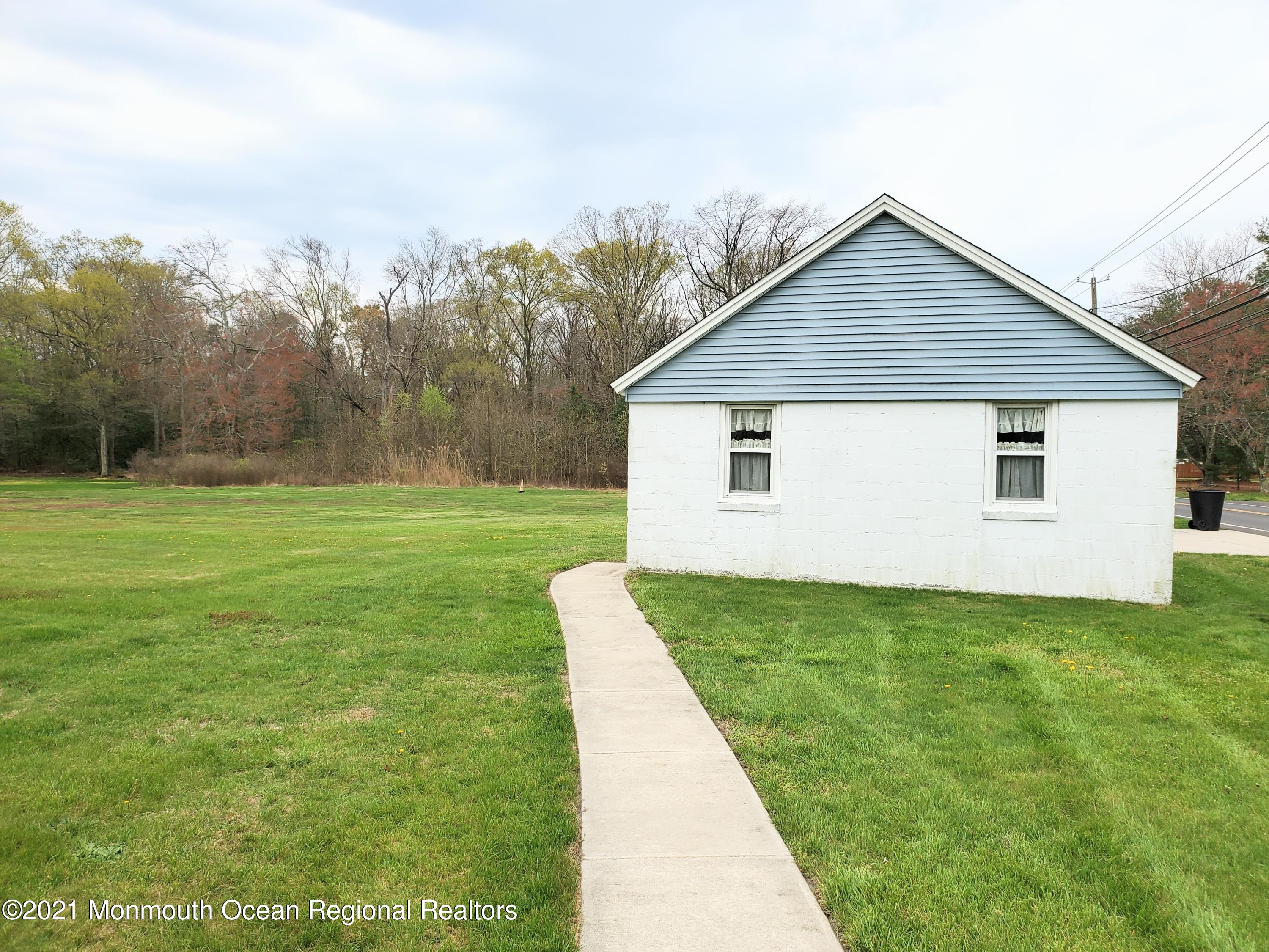 50 Hawkin Road Medford, NJ 08055 - Photo 23 of 28 a view of a backyard with a garden