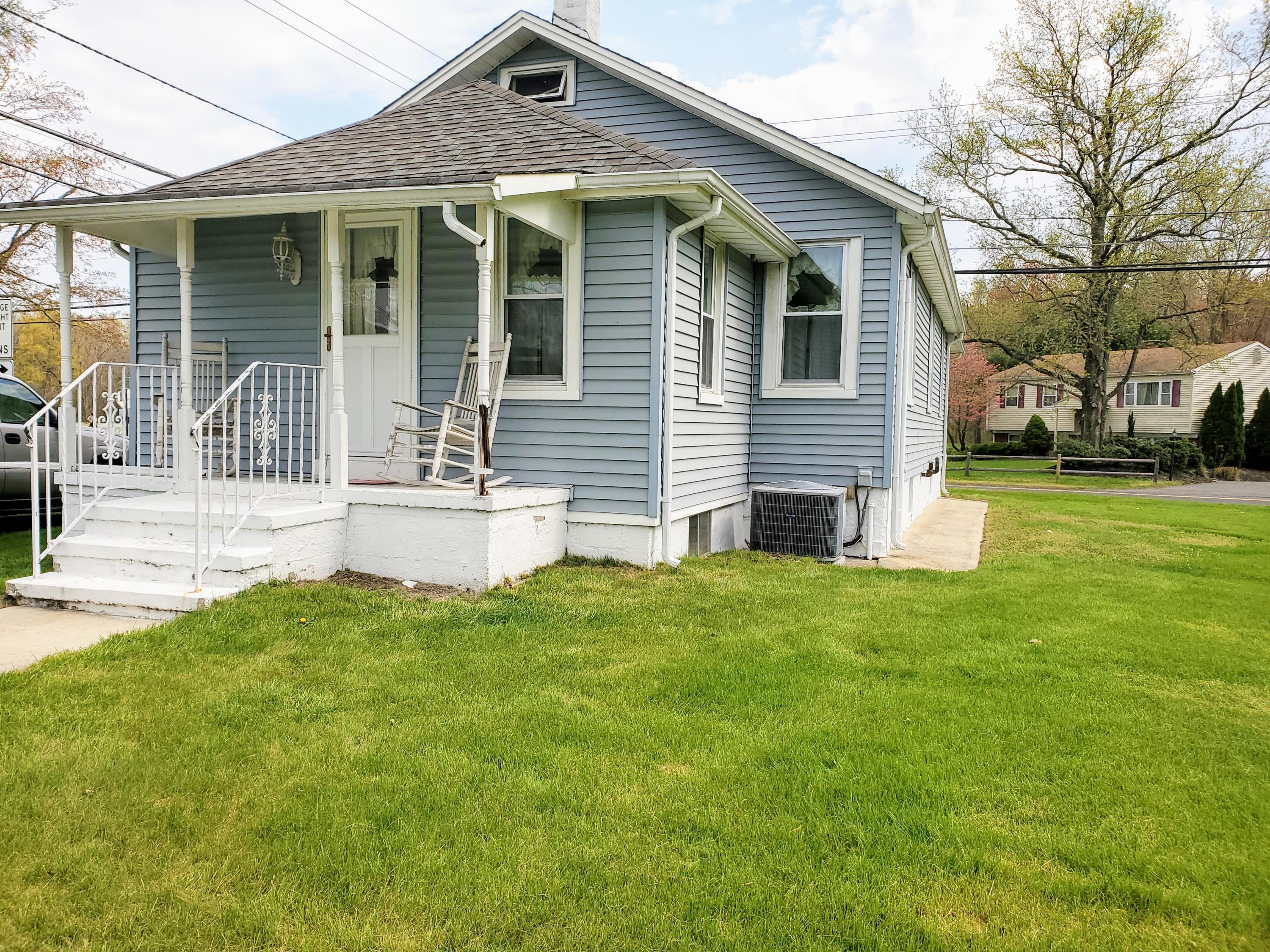 50 Hawkin Road Medford, NJ 08055 - Photo 28 of 28 a front view of a house with a garden and yard