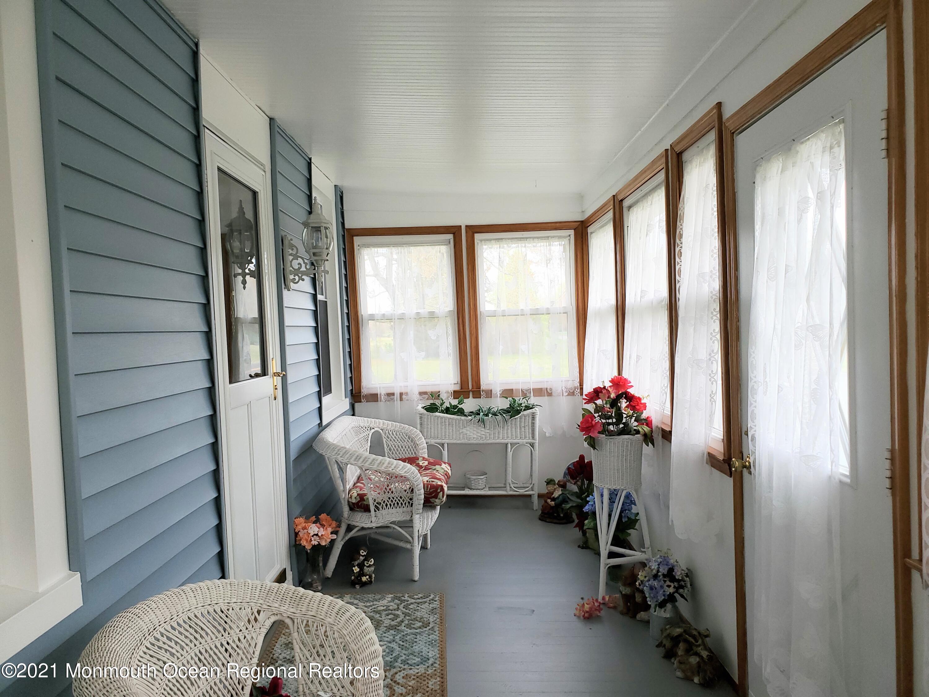 50 Hawkin Road Medford, NJ 08055 - Photo 5 of 28 a room with furniture and a large window