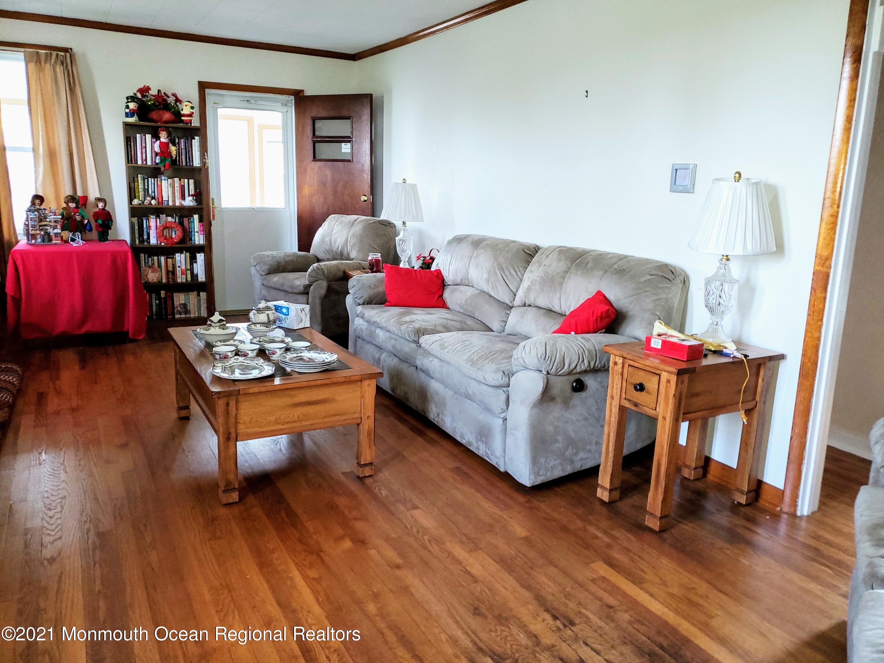 50 Hawkin Road Medford, NJ 08055 - Photo 6 of 28 a living room with furniture and wooden floor