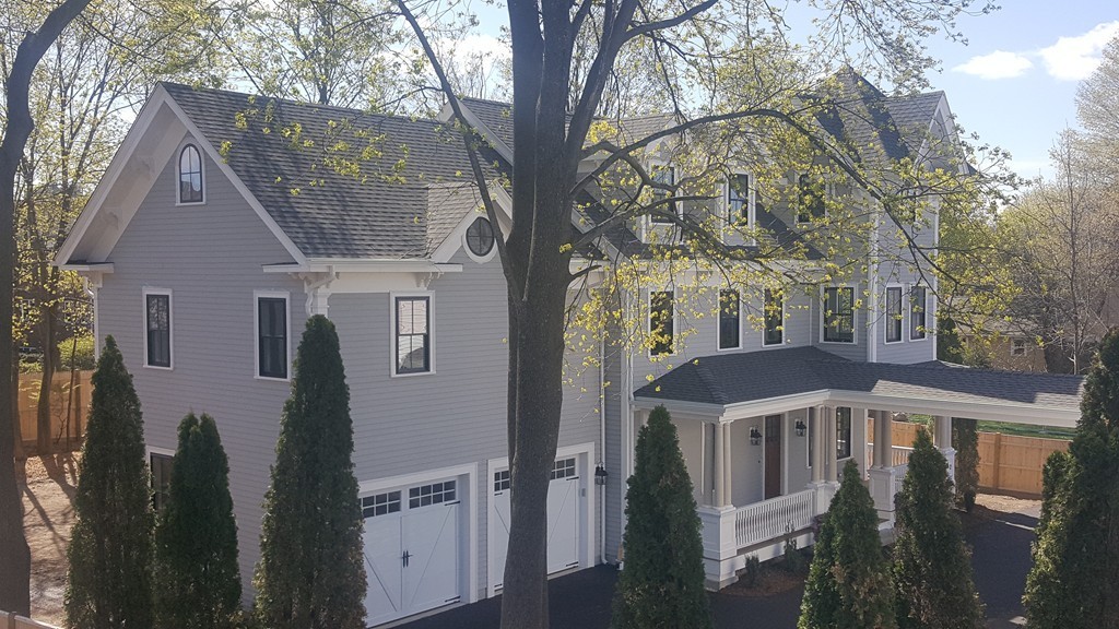 62 Maple Street, Unit 2 Needham, MA 02492 - Photo 1 of 25 a view of a house with a yard