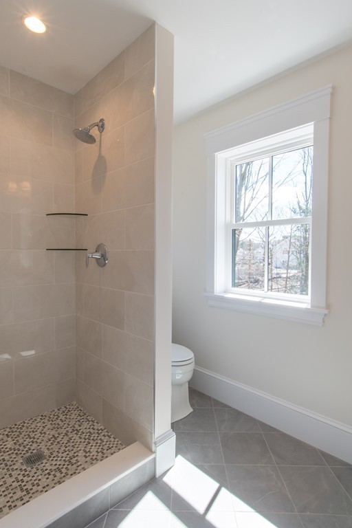 62 Maple Street, Unit 2 Needham, MA 02492 - Photo 17 of 25 a bathroom with a shower