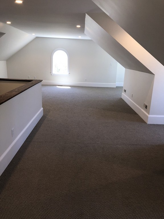 62 Maple Street, Unit 2 Needham, MA 02492 - Photo 21 of 25 a view of empty room with window