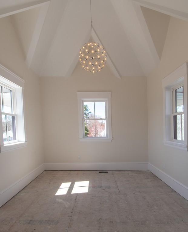 62 Maple Street, Unit 2 Needham, MA 02492 - Photo 23 of 25 an empty room with a window